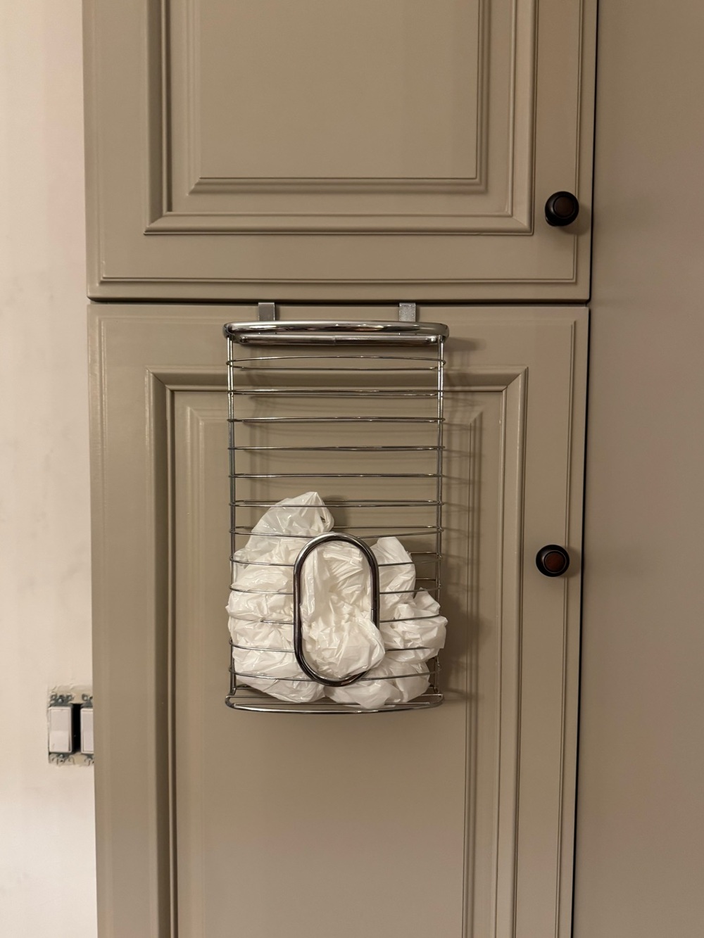 Chrome over door bag holder